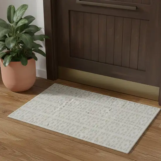 Ivory And Beige Geometric Washable Area Rug With UV Protection Photo 1