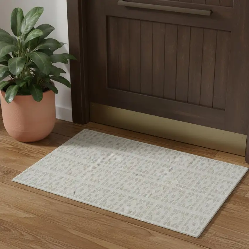 Ivory And Beige Geometric Washable Area Rug With UV Protection Photo 1