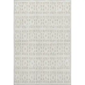 Photo of Ivory And Beige Geometric Washable Area Rug With UV Protection