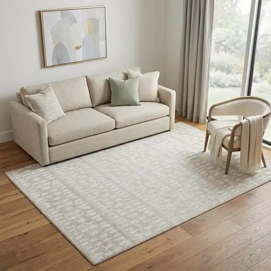 Ivory And Beige Geometric Washable Area Rug With UV Protection Photo 1
