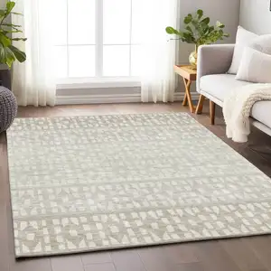 Photo of Ivory And Beige Geometric Washable Area Rug With UV Protection