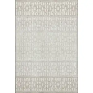 Photo of Ivory And Beige Geometric Washable Area Rug With UV Protection