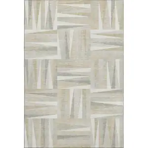 Photo of Ivory And Beige Geometric Washable Area Rug With UV Protection
