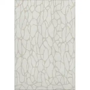 Photo of Ivory And Beige Geometric Washable Area Rug With UV Protection