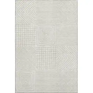 Photo of Ivory And Beige Geometric Washable Area Rug With UV Protection
