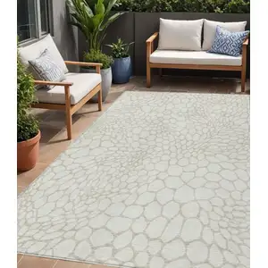 Photo of Ivory And Beige Geometric Washable Indoor Outdoor Area Rug