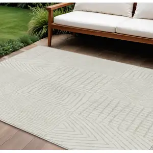 Photo of Ivory And Beige Geometric Washable Indoor Outdoor Area Rug