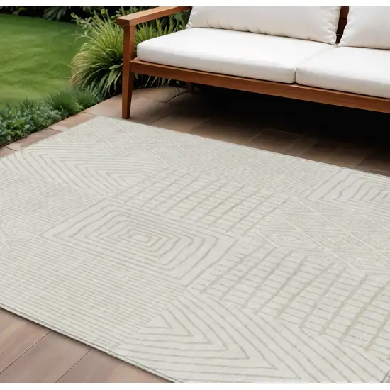 Ivory And Beige Geometric Washable Indoor Outdoor Area Rug Photo 1