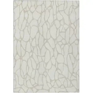 Photo of Ivory And Beige Geometric Washable Indoor Outdoor Area Rug