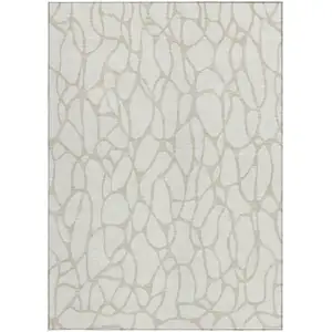 Photo of Ivory And Beige Geometric Washable Indoor Outdoor Area Rug