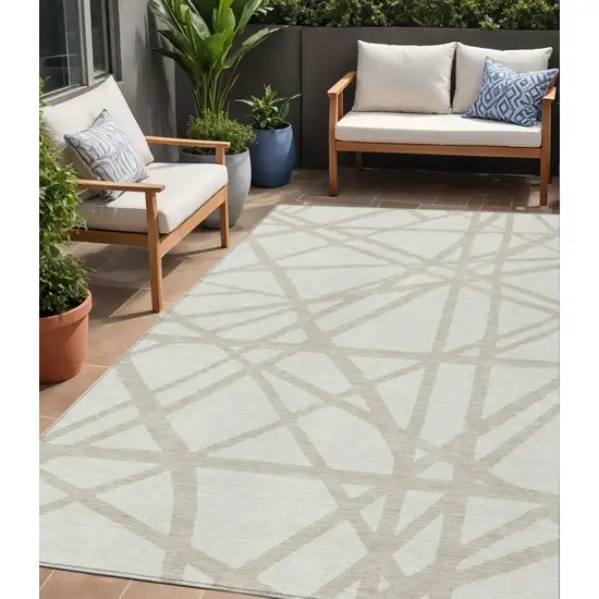 Ivory And Beige Geometric Washable Indoor Outdoor Area Rug Photo 1