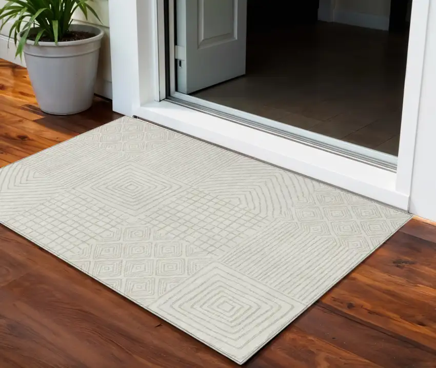 Ivory And Beige Geometric Washable Indoor Outdoor Area Rug Photo 1