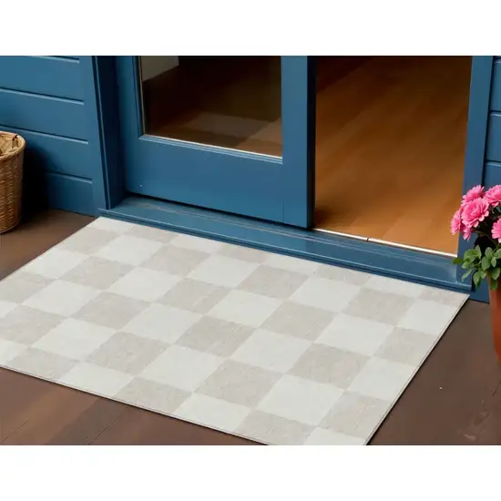 Ivory And Beige Geometric Washable Indoor Outdoor Area Rug Photo 1