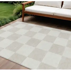 Photo of Ivory And Beige Geometric Washable Indoor Outdoor Area Rug