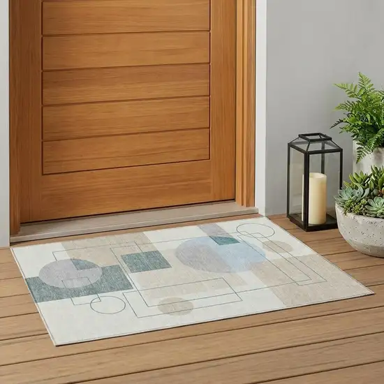 Ivory And Beige Geometric Washable Indoor Outdoor Area Rug Photo 1
