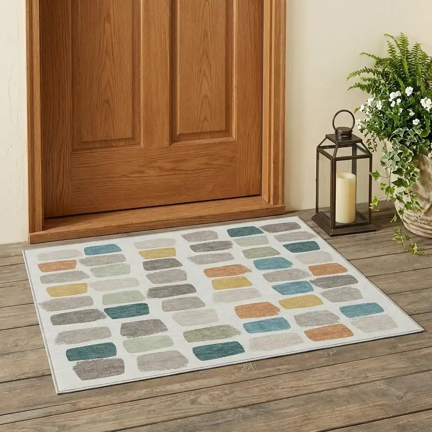 Ivory And Beige Geometric Washable Indoor Outdoor Area Rug Photo 1