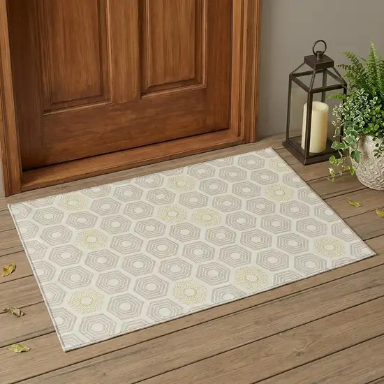 Ivory And Beige Geometric Washable Indoor Outdoor Area Rug Photo 1