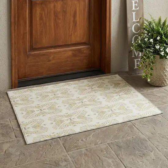 Ivory And Beige Geometric Washable Indoor Outdoor Area Rug Photo 1
