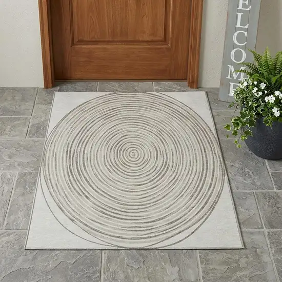 Ivory And Beige Geometric Washable Indoor Outdoor Area Rug Photo 1