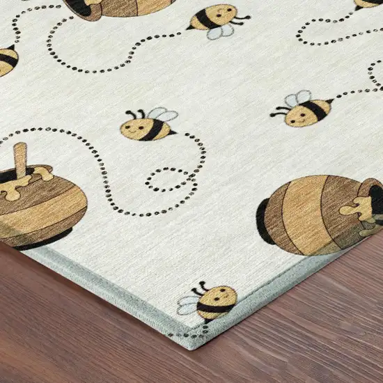 Ivory And Beige Geometric Washable Indoor Outdoor Area Rug Photo 7