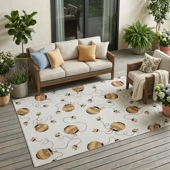 Ivory And Beige Geometric Washable Indoor Outdoor Area Rug Photo 1