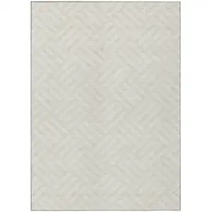 Photo of Ivory And Beige Geometric Washable Indoor Outdoor Area Rug