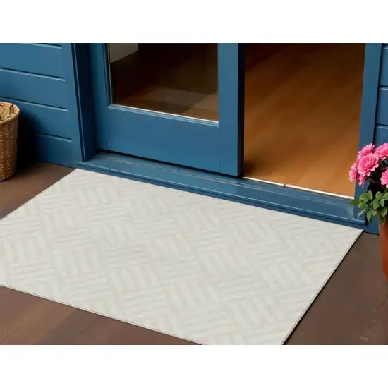Ivory And Beige Geometric Washable Indoor Outdoor Area Rug Photo 1