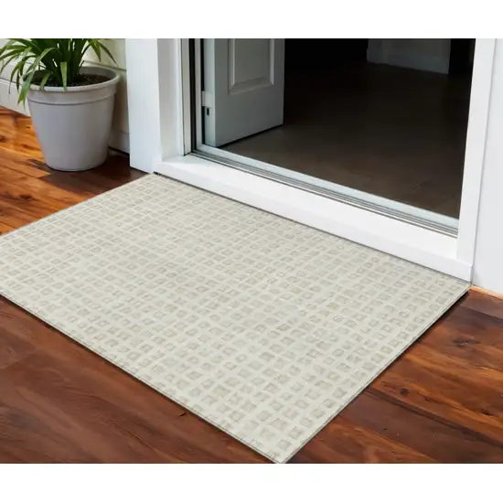 Ivory And Beige Geometric Washable Indoor Outdoor Area Rug Photo 1
