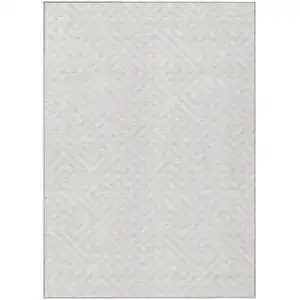 Photo of Ivory And Beige Geometric Washable Indoor Outdoor Area Rug