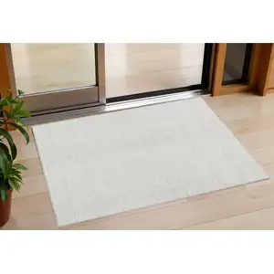 Photo of Ivory And Beige Geometric Washable Indoor Outdoor Area Rug