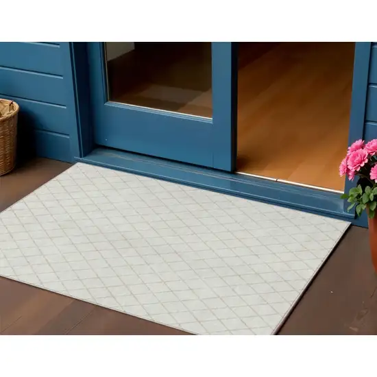 Ivory And Beige Geometric Washable Indoor Outdoor Area Rug Photo 1