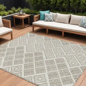 Photo of Ivory And Beige Geometric Washable Indoor Outdoor Area Rug
