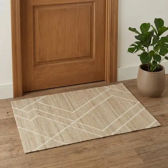 Ivory And Beige Jute Abstract Hand Woven Area Rug Photo 1