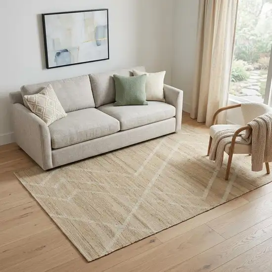 Ivory And Beige Jute Abstract Hand Woven Area Rug Photo 1
