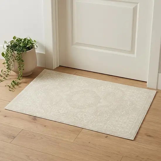 Ivory And Beige Medallion Area Rug Photo 1