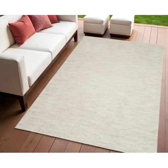 Beige And Ivory Indoor Outdoor Area Rug Photo 1