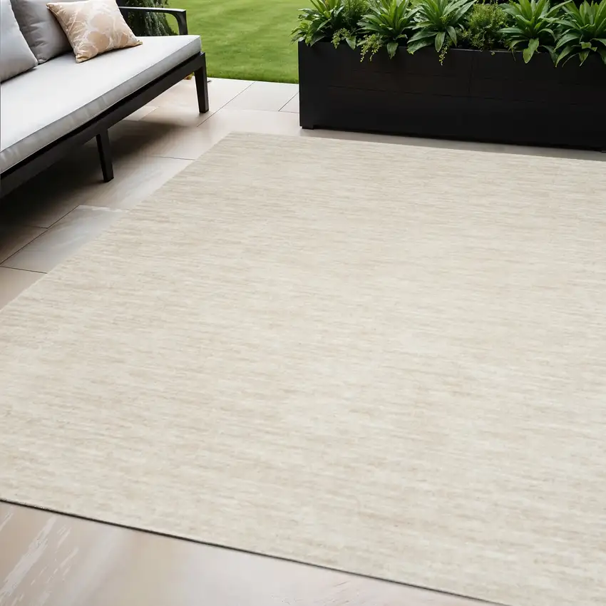 Beige And Ivory Indoor Outdoor Area Rug Photo 1