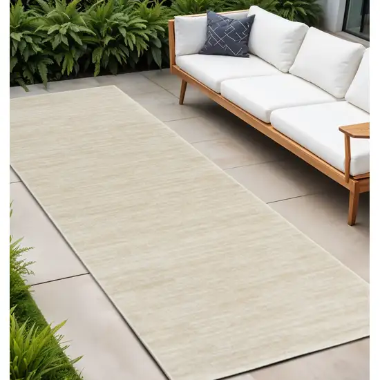 Ivory And Beige Non Skid Indoor Outdoor Runner Rug Photo 1