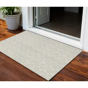 Photo of Ivory And Beige Ogee Washable Indoor Outdoor Area Rug