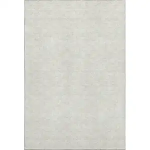 Photo of Ivory And Beige Polka Dot Washable Area Rug With UV Protection