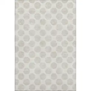 Photo of Ivory And Beige Polka Dot Washable Area Rug With UV Protection