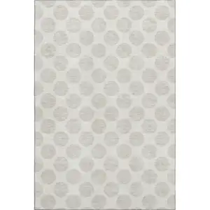 Photo of Ivory And Beige Polka Dot Washable Area Rug With UV Protection