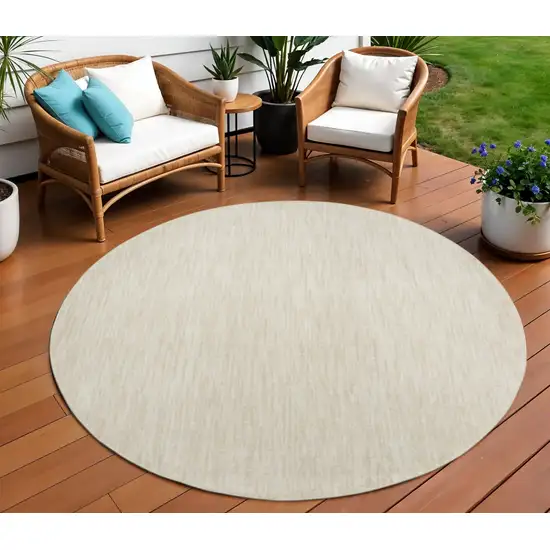 Beige And Ivory Round Indoor Outdoor Area Rug Photo 2