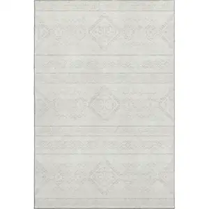 Photo of Ivory And Beige Southwestern Washable Area Rug With UV Protection