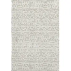 Photo of Ivory And Beige Southwestern Washable Area Rug With UV Protection