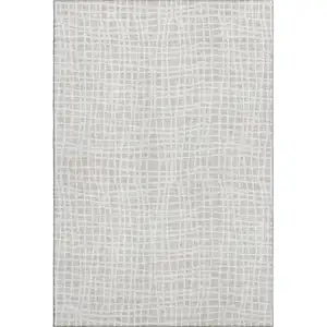 Photo of Ivory And Beige Striped Washable Area Rug With UV Protection