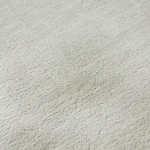 Photo of Ivory And Beige Striped Washable Area Rug With UV Protection