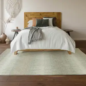 Photo of Ivory And Beige Striped Washable Area Rug With UV Protection