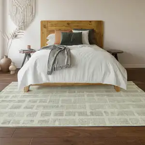 Photo of Ivory And Beige Striped Washable Area Rug With UV Protection