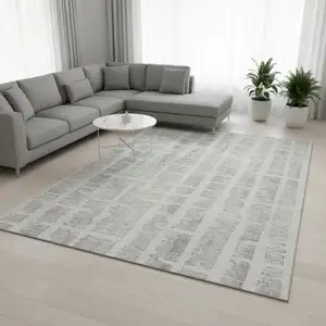 Photo of Ivory And Beige Striped Washable Area Rug With UV Protection